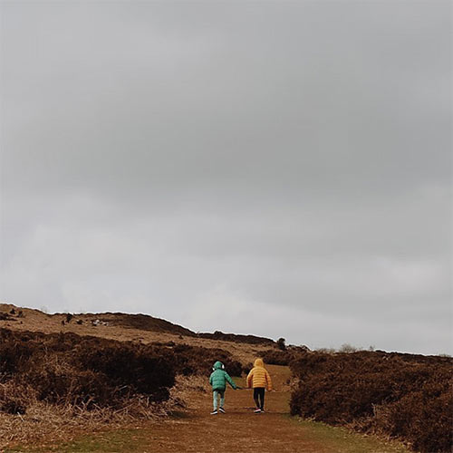 two kids in the dunes