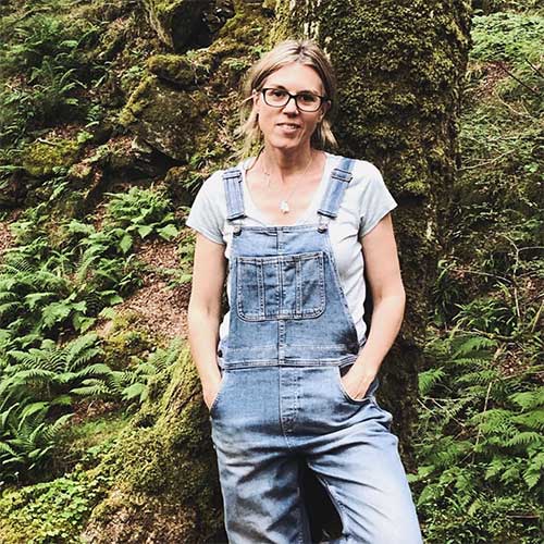 claire branigan standing in front of a tree