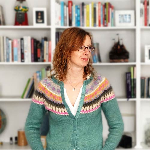 Gabrielle Treanor in front of a bookcase