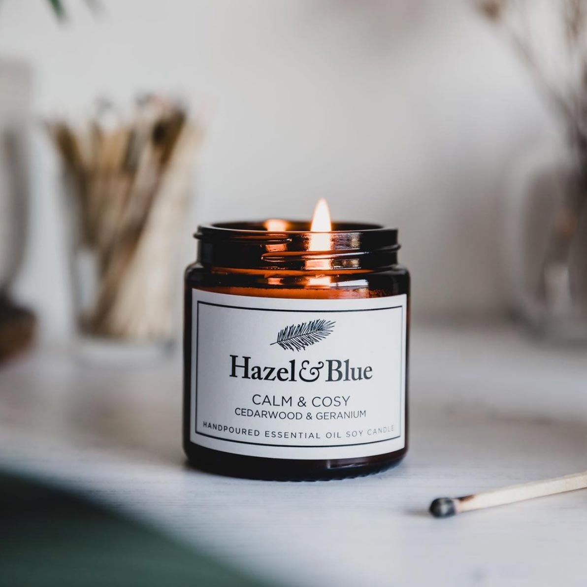 candle from hazel and blue