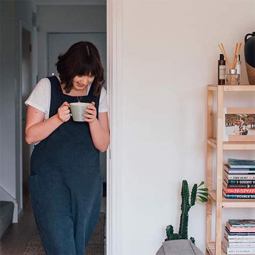 jen carrington holding a cup of tea