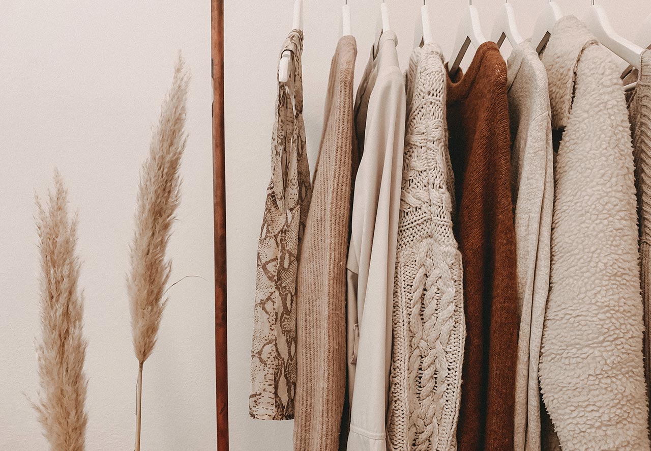 a rack with clothes - fashion items