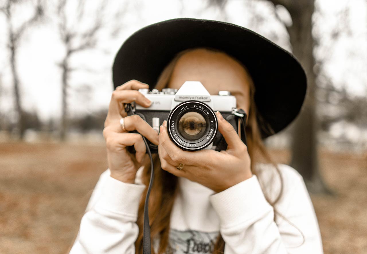 a girl with a photo camera