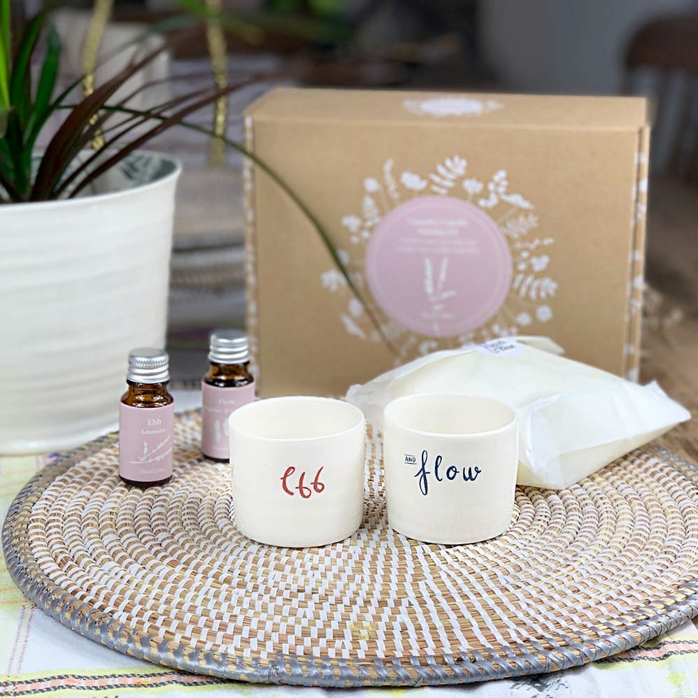 image of couple candle making kit from hazel & blue consisting of a box, two candle jars, a paper bag with soy wax and two small bottles with essential oils