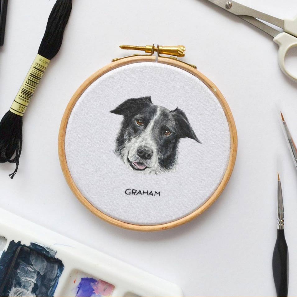 painted pet portrait of a dog in an embroidery hoop