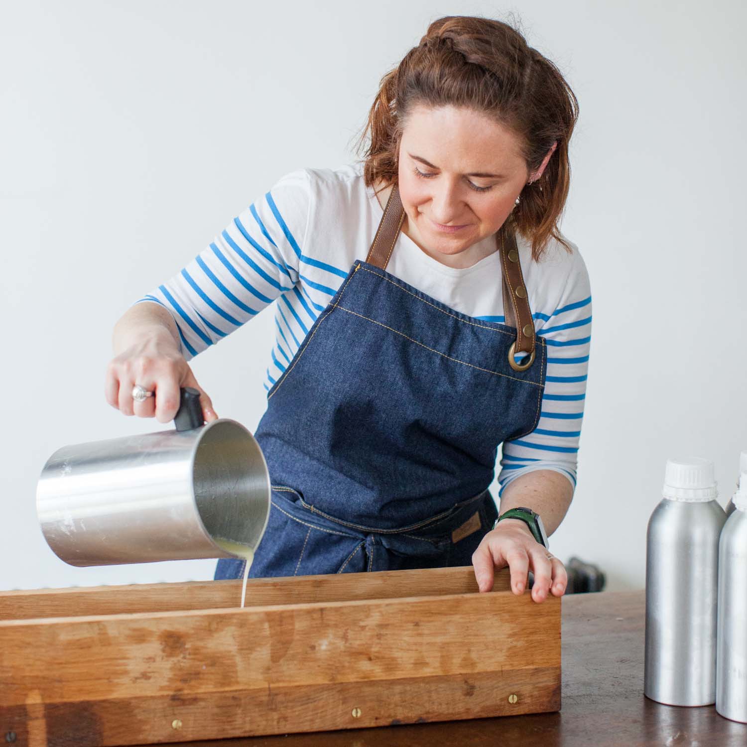 noelene from simple home holism pouring soap in a mold