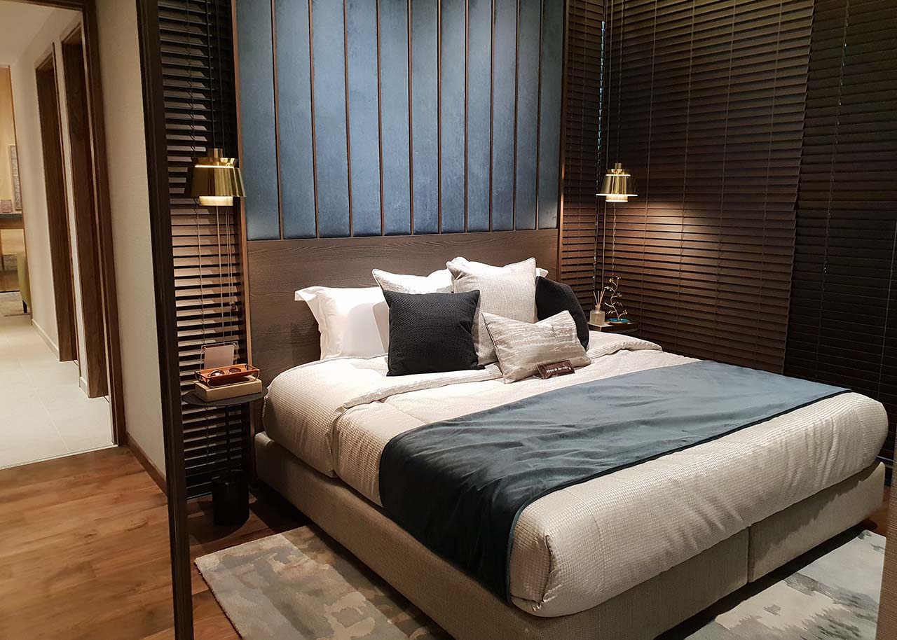 a stylish bedroom in a serviced apartment - best accommodations for slow travel