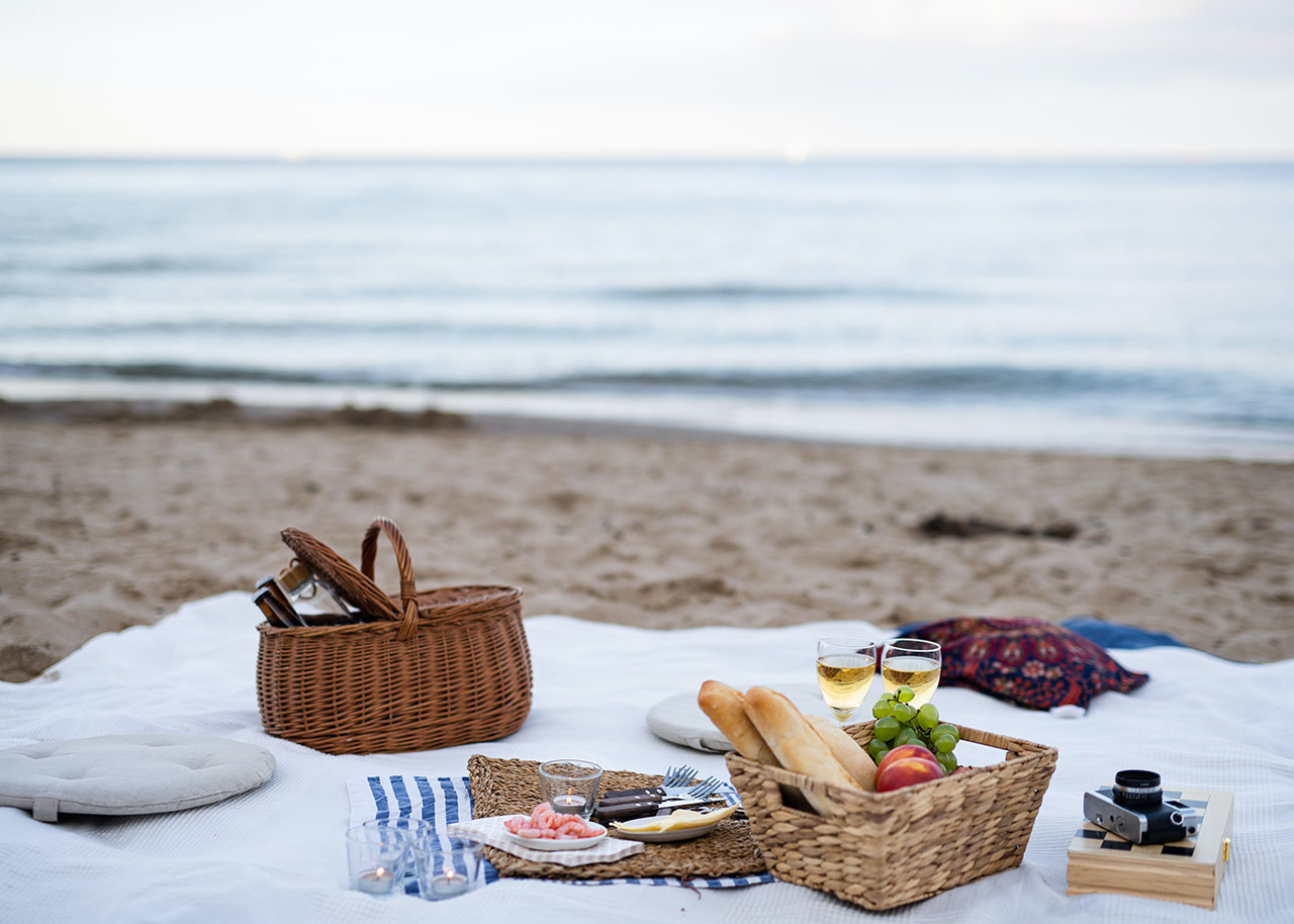 why you need a staycation - picnic at the beach
