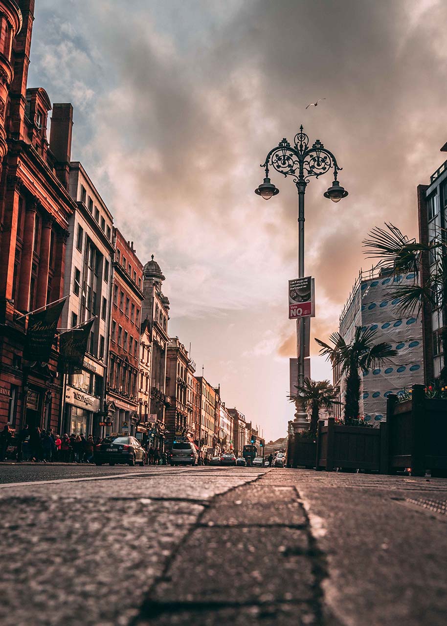 a photograph of a city street taken from a low angle - slow photography